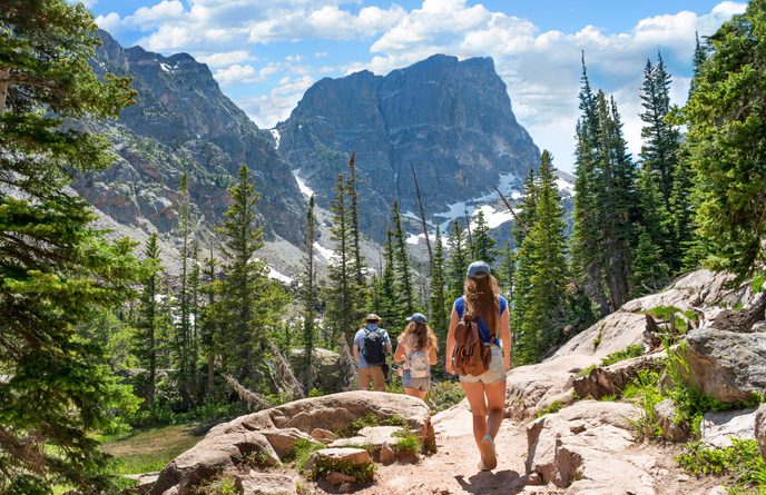 group of people on hiking tour in the mountains