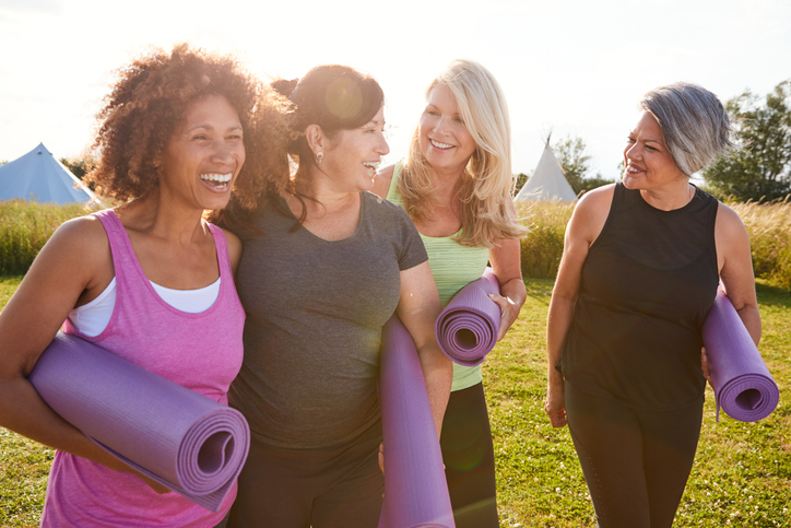 happy women at yoga retreat